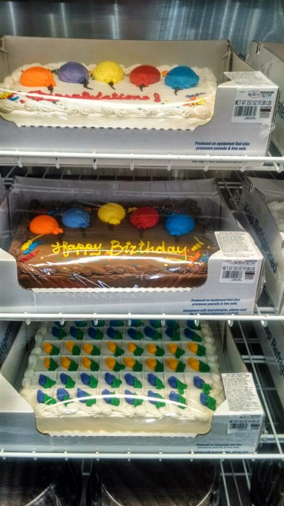 Decorated vanilla and chocolate birthday sheet cakes at Costco